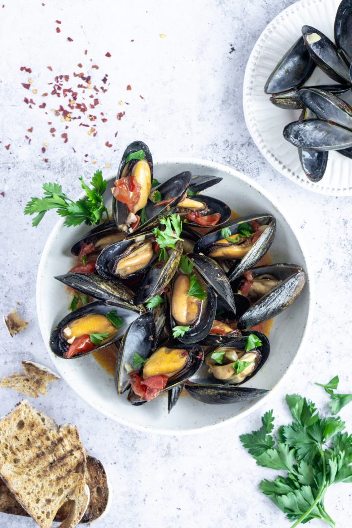 Steamed Mussels with White Wine, Garlic and Tomato Broth Pina Bresciani
