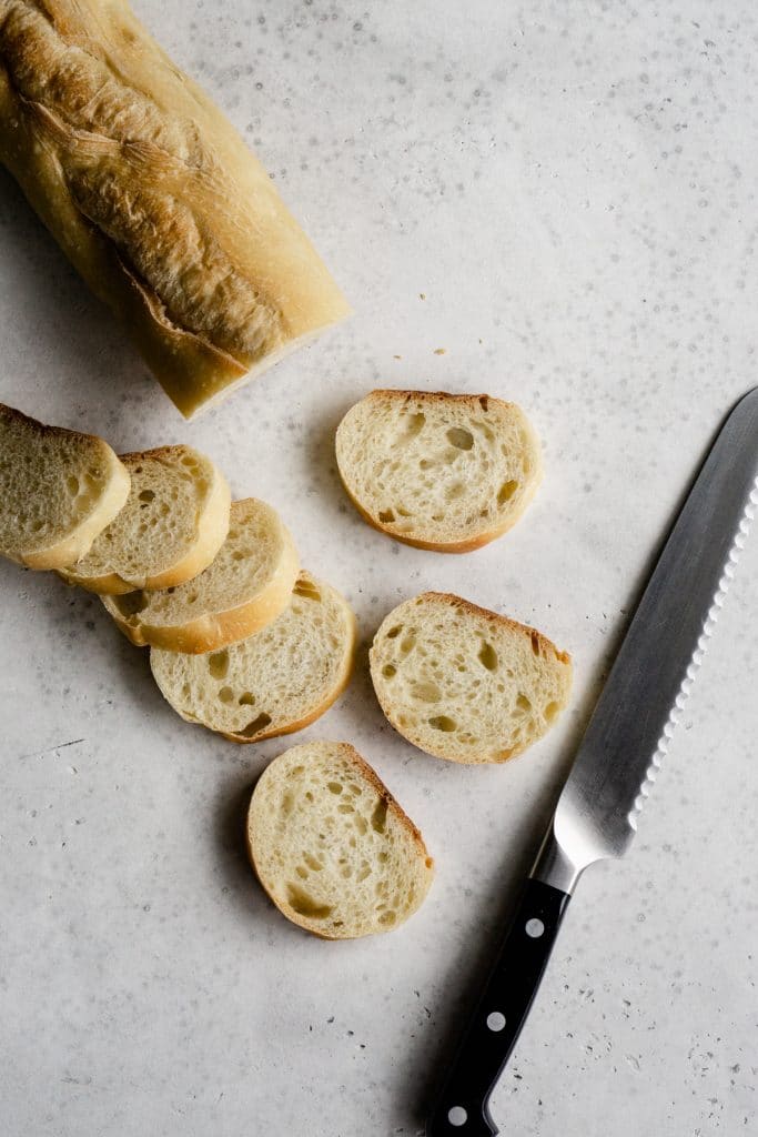 Slices of baguette cut with a knife