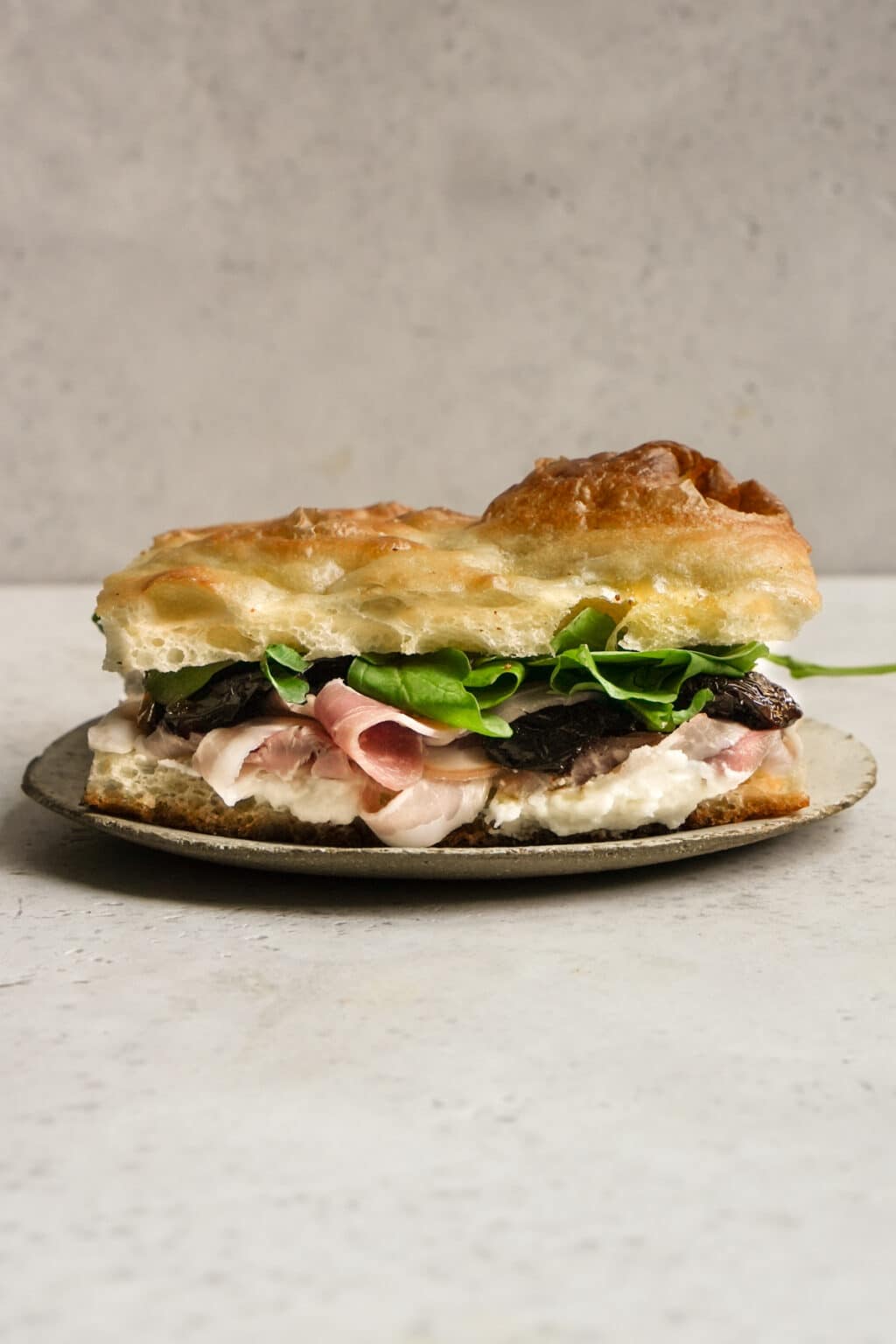 Pancetta Sandwich with Pecorino Cream, Sundried Tomatoes and Arugula