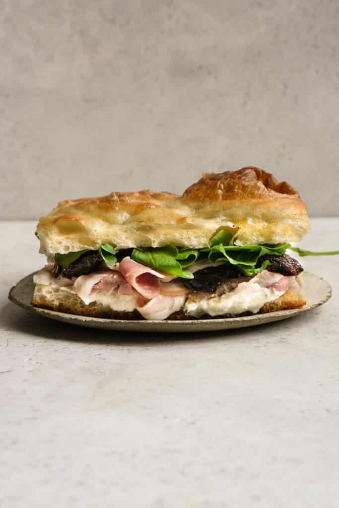 Pancetta Sandwich with Pecorino Cream, Sundried Tomatoes and Arugula Pina Bresciani