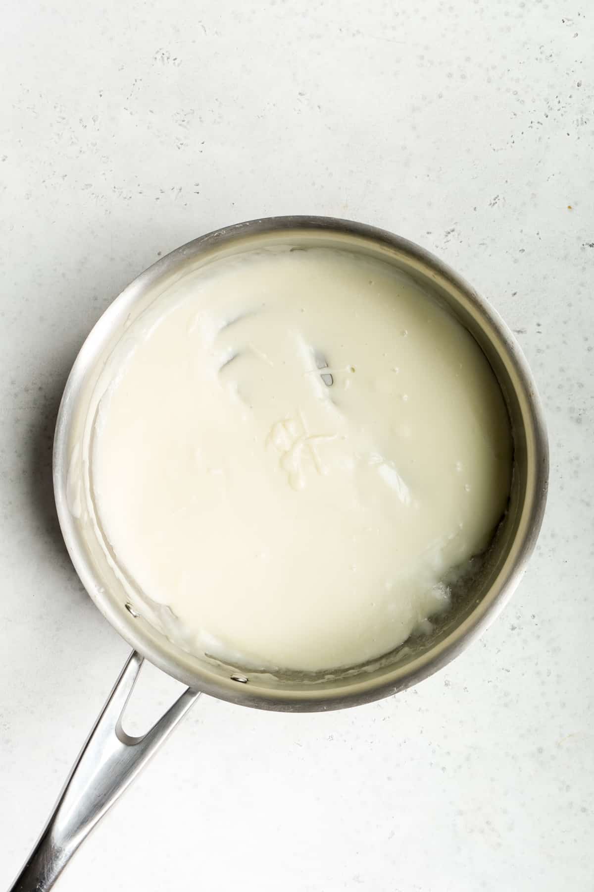Pecorino cream in a pan