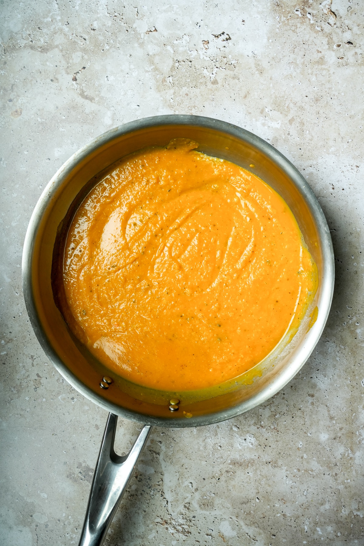 Overhead photo of pumpkin pasta sauce in a pan