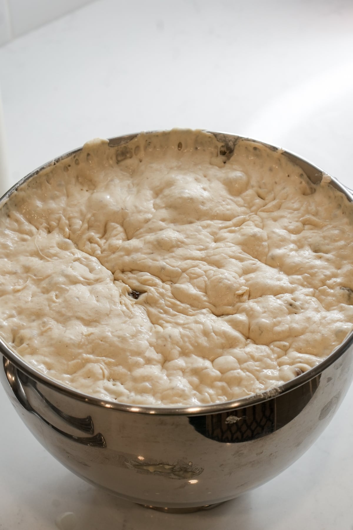 zeppole dough in a bowl that has risen
