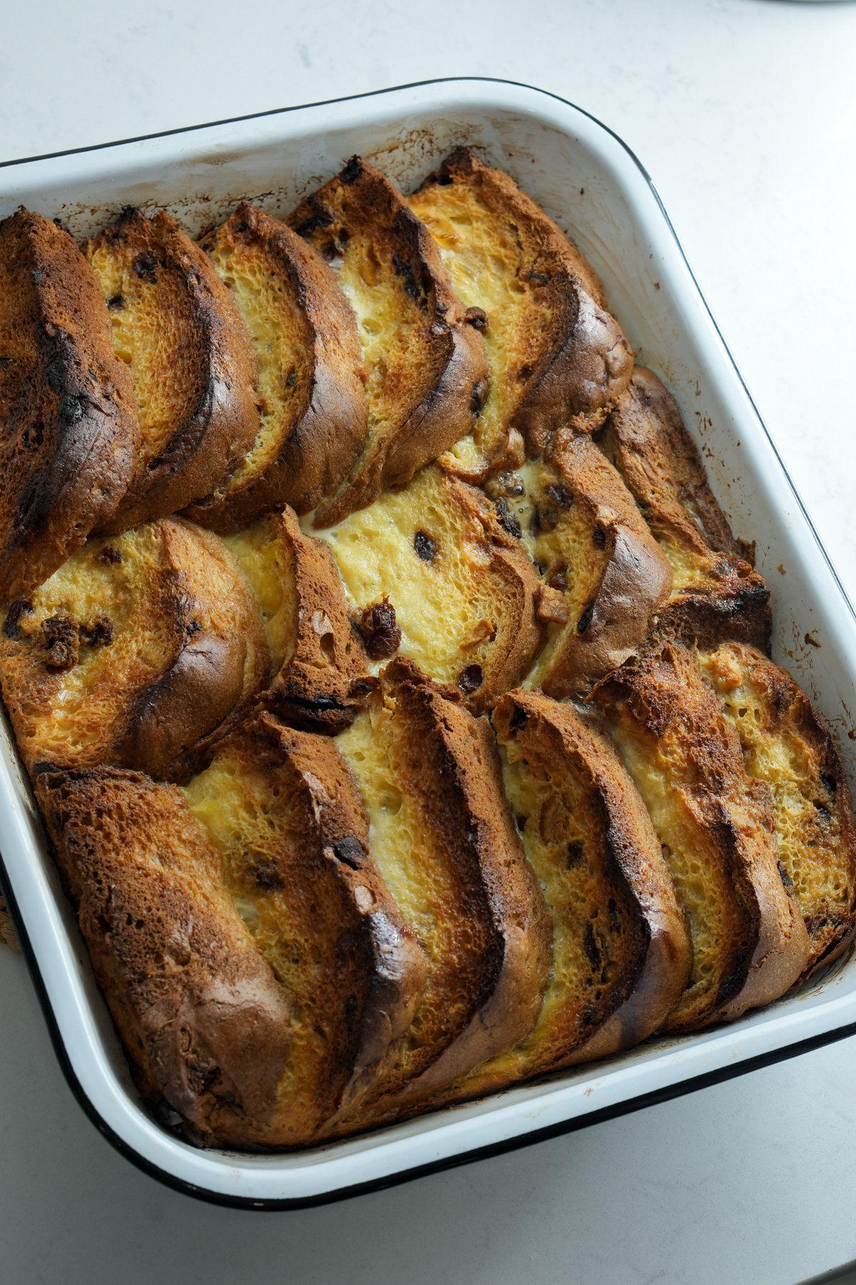 Baked overnight panettone french toast casserole in a baking dish