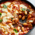 gnocchi alla sorrentina in a pan with a scoop taken out