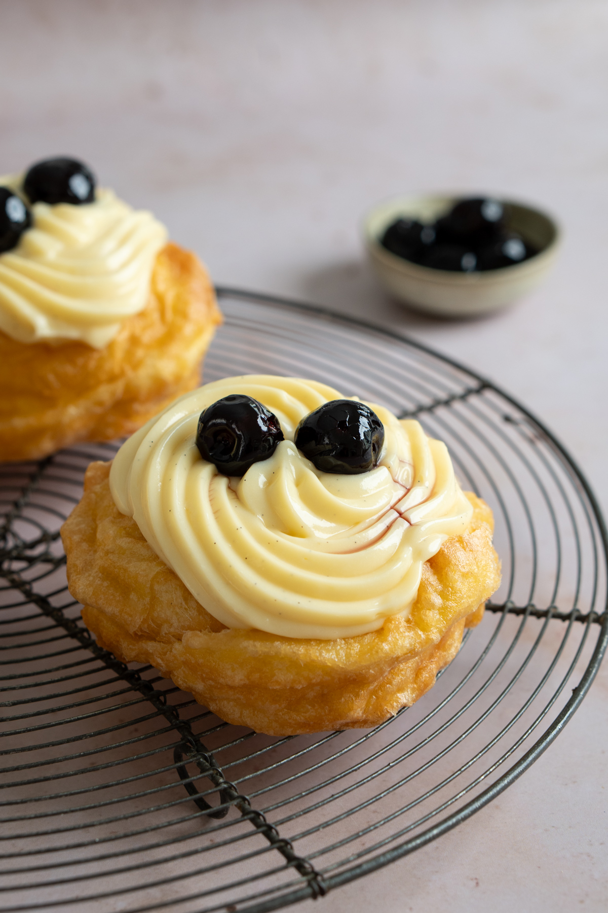 Zeppola di San Giuseppe topped with amarena cherries