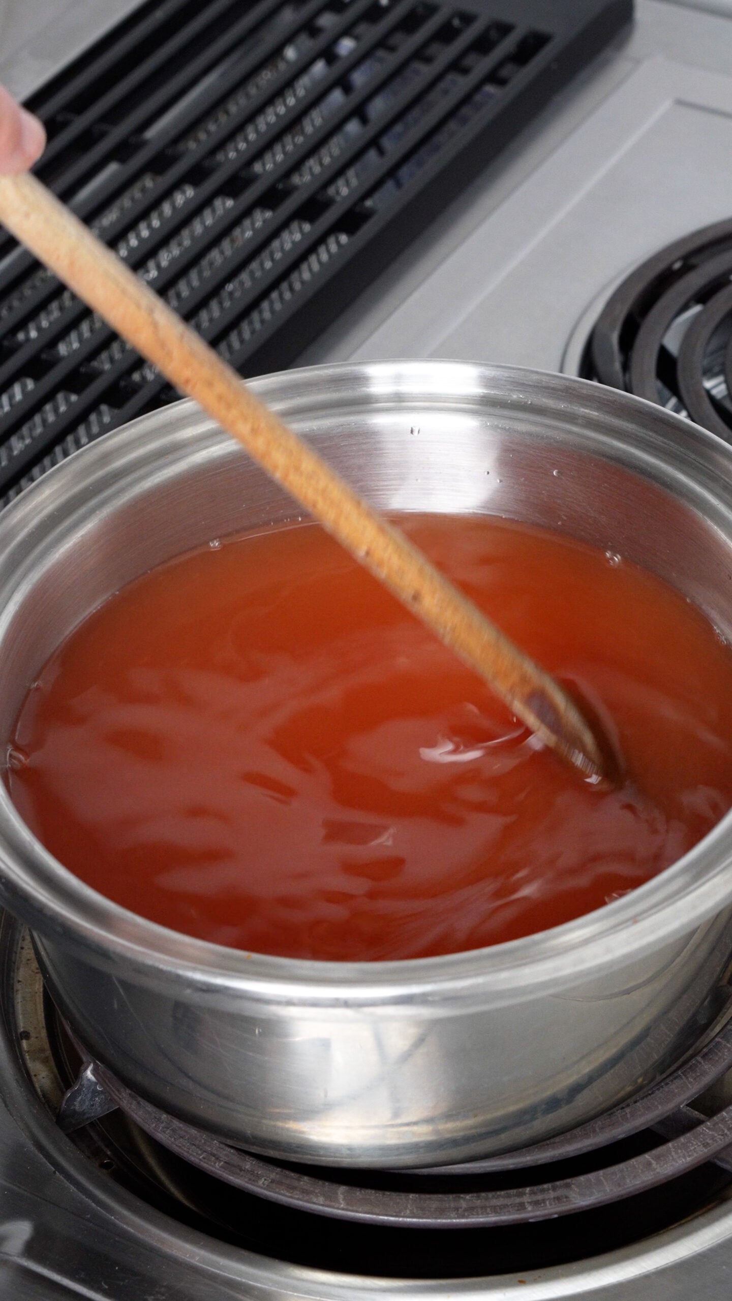 Tomato broth in a saucepan