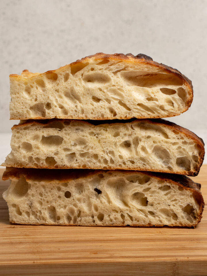 Three pieces of focaccia stacked on top of each other