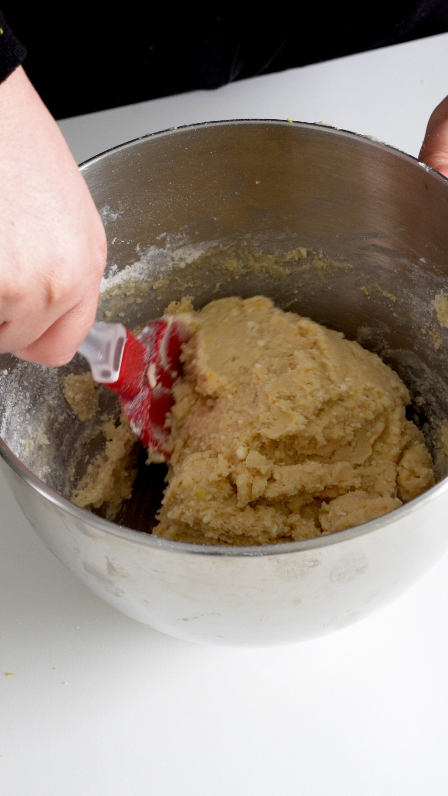 Lemon ricotta cookie dough in the bowl of a stand mixer