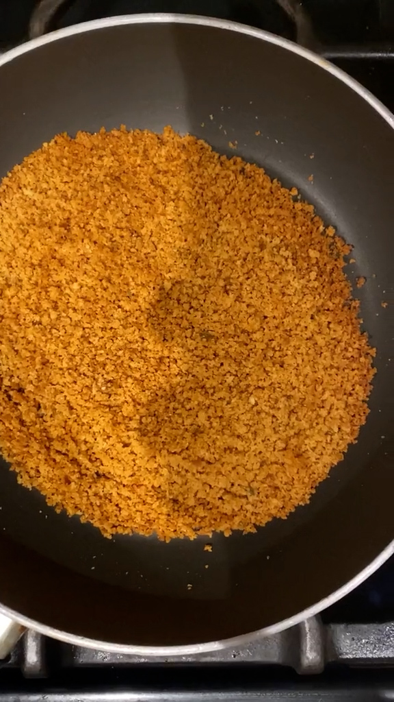 Toasted bread crumbs in a pan